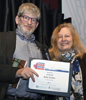 <b>John Lorinc</b> receives the Award for Memoir from juror Anna Porter.